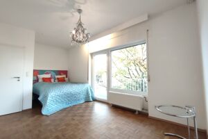 Schlafzimmer mit Balkonzugang